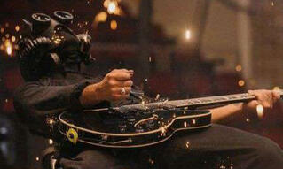 Crazy, Possessed, Loves falling off his stage, F I R E, Amazing Vocals, Amazing guitar too :3